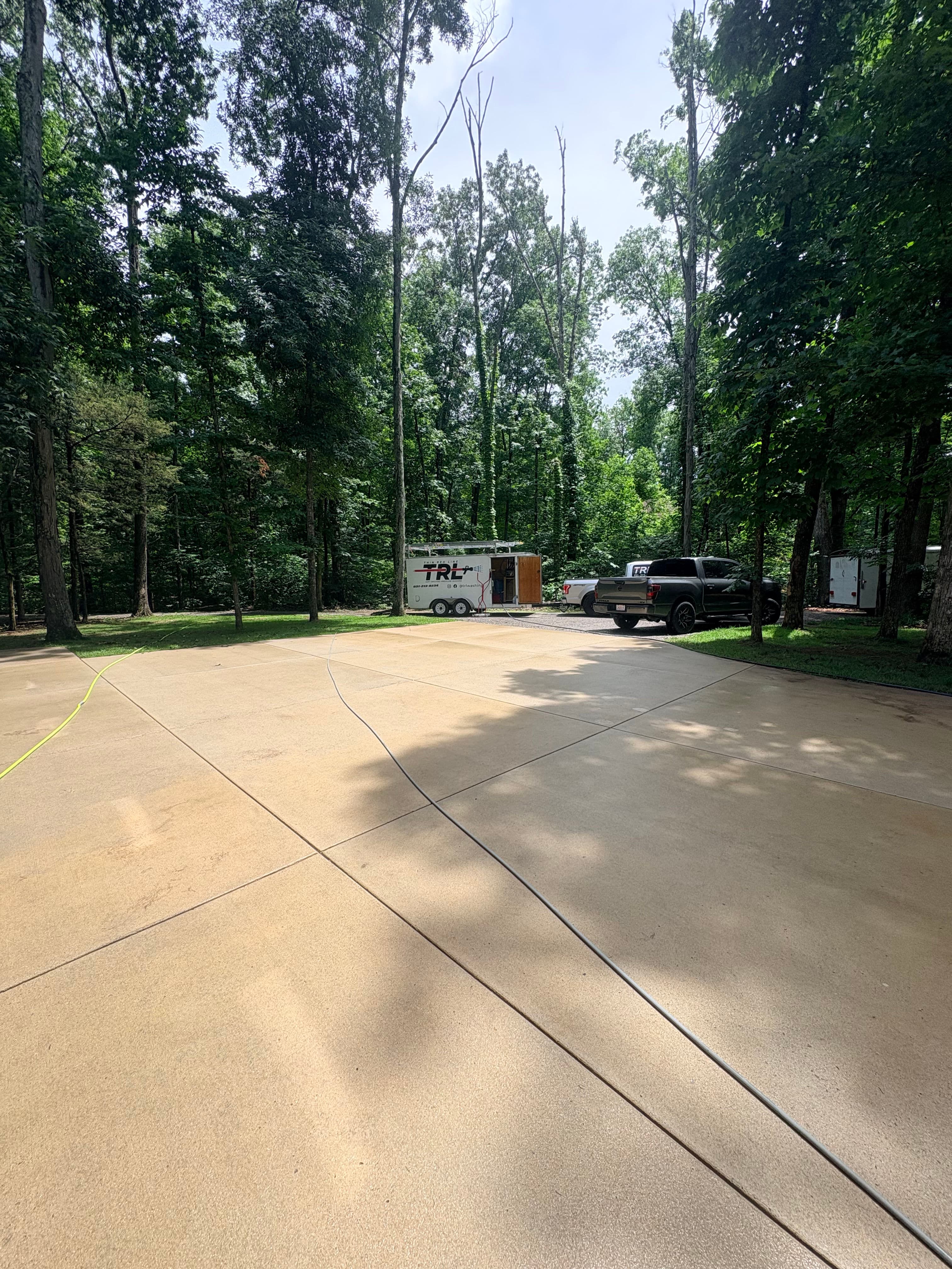 Project Red Clay Stains on Your Driveway and Siding Don't Stand a Chance image