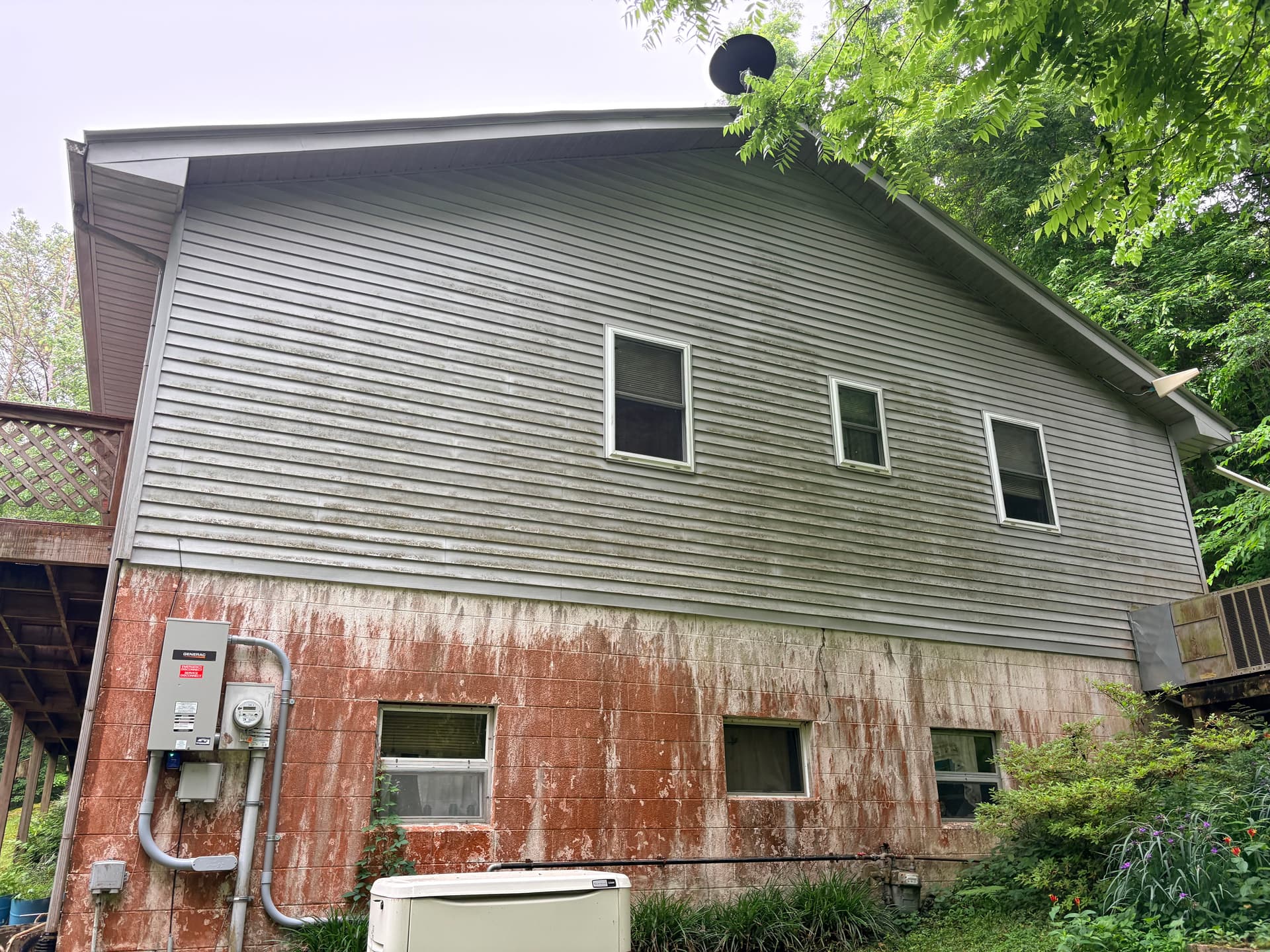 Heavy Algae and Rust Gone After Full House Soft Wash image